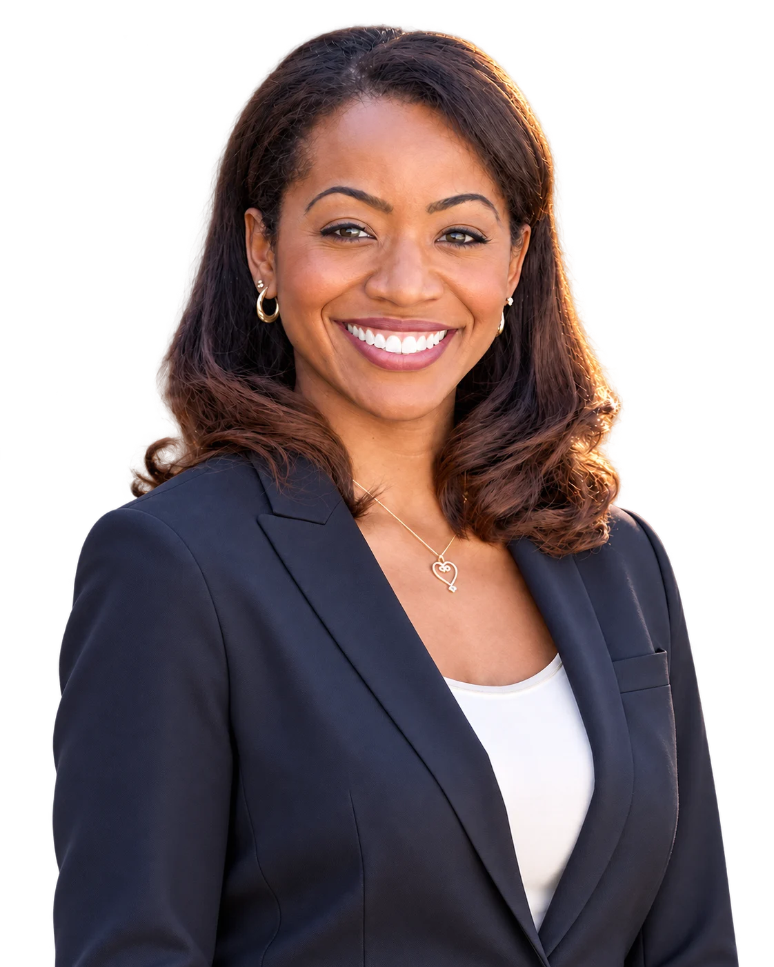 Malia Cohen smiling in a navy blazer, with sunlight along her hair, against an illustrative California park.